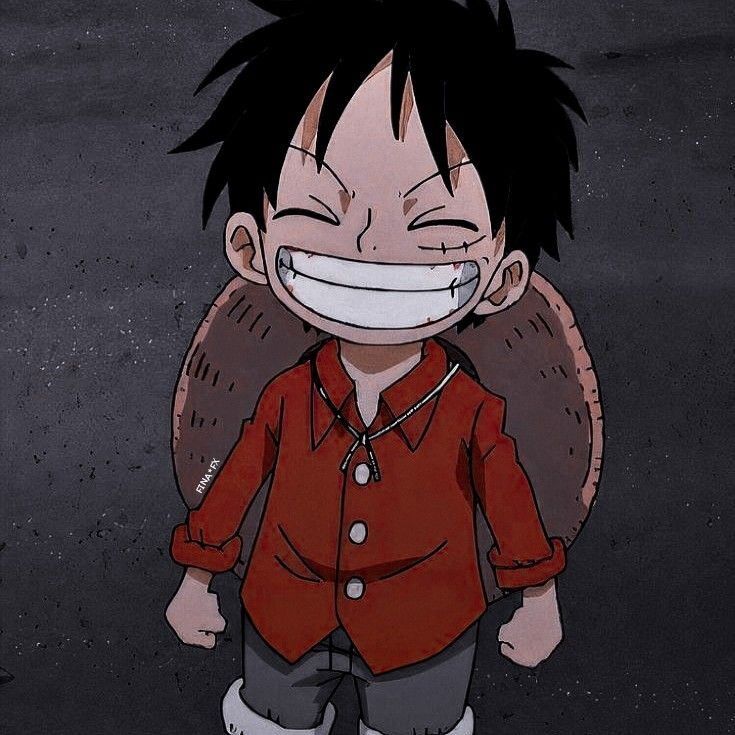 Foto de Perfil Masculino Sorridente em Camisa Vermelha